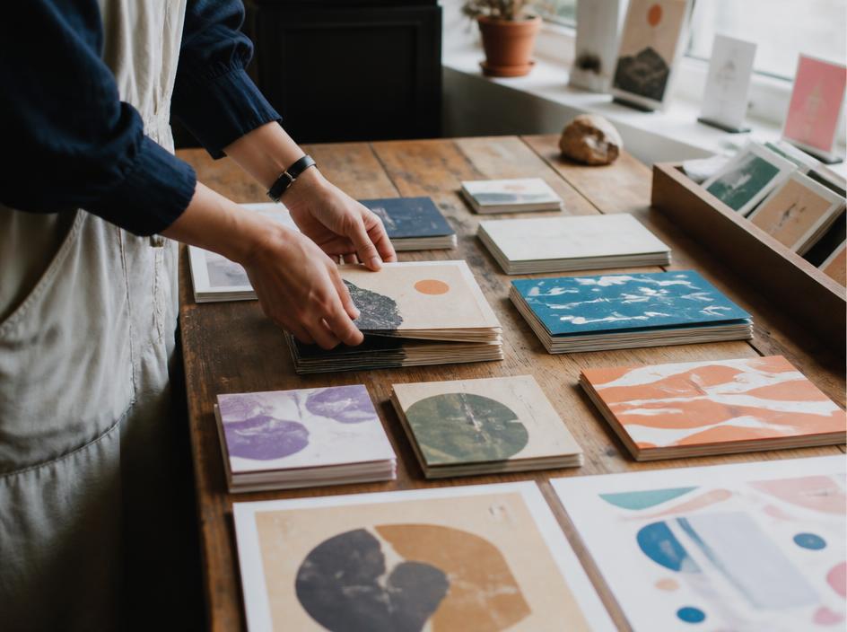 Illustration of handmade zines, chapbooks, and a fountain pen